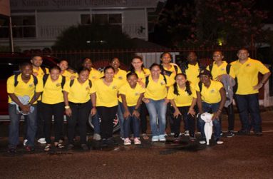 CAC TEAM –Guyana’s first contingent to the CAC Games in Mexico shortly before leaving Olympic House. At right is Philip Fernandes.