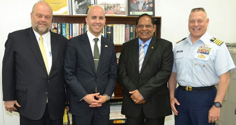 At left, US Ambassador to Guyana Perry Holloway, representative of the US President Juan Gonzalez and Captain Robert Landolfi of the US Coast Guard, with Prime Minister Moses Nagamootoo (second right)