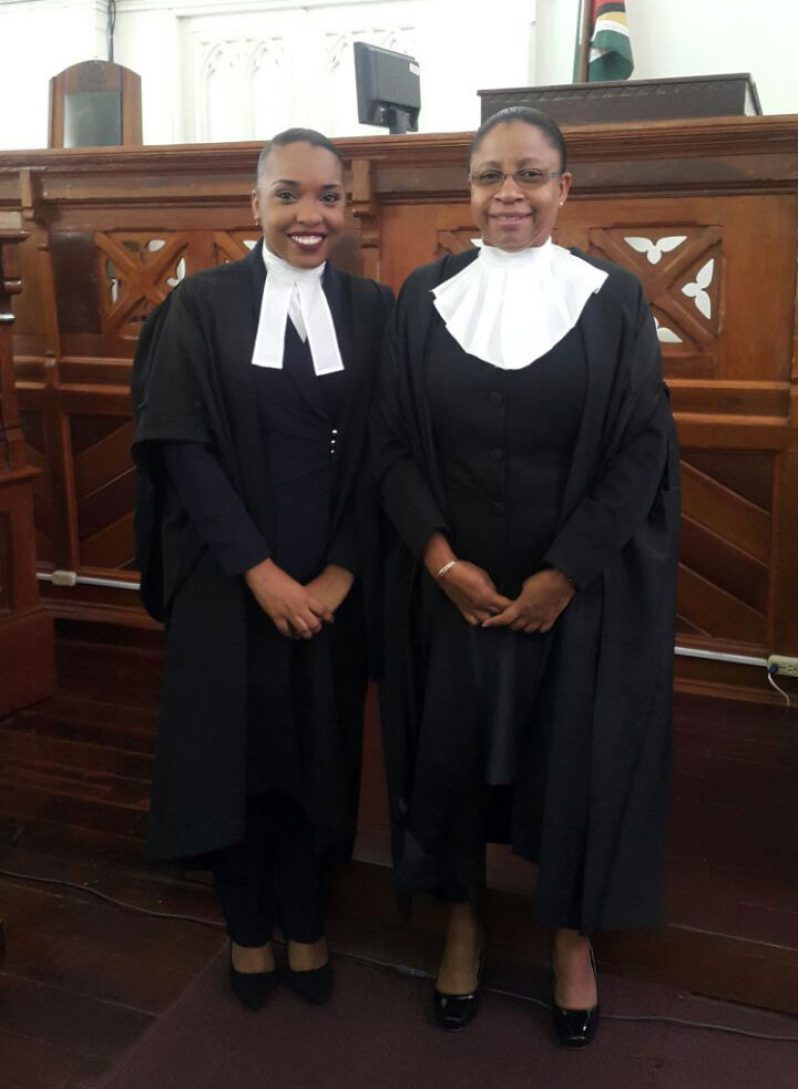Newly-admitted Attorney-at-law, Erica Cappell with Chief Justice (ag) Roxane George Wiltshire before whom her petition for admittance to the Bar was presented.