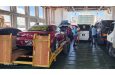 One of the cars for Sunday’s event being loaded onto the ferry for Essequibo