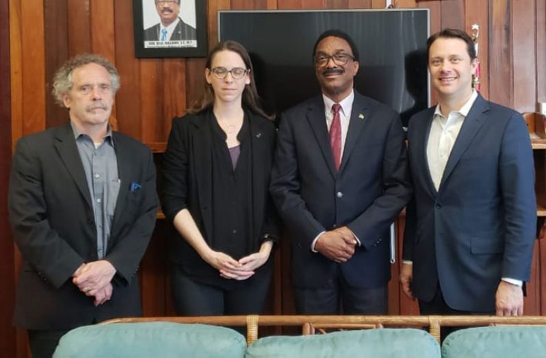 Attorney-General and Minister of Legal Affairs, Basil Williams (second right), with (from left) members of the visiting Carter Center team, Davis J. Caroll, Brett Lacy and Jason J. Carter