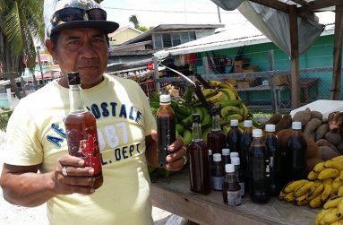 Denis Campbel with his products