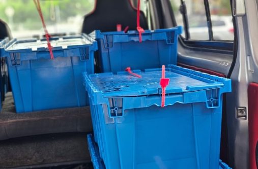 Preparations on Sunday for  distribution of the Because We Care cash grants