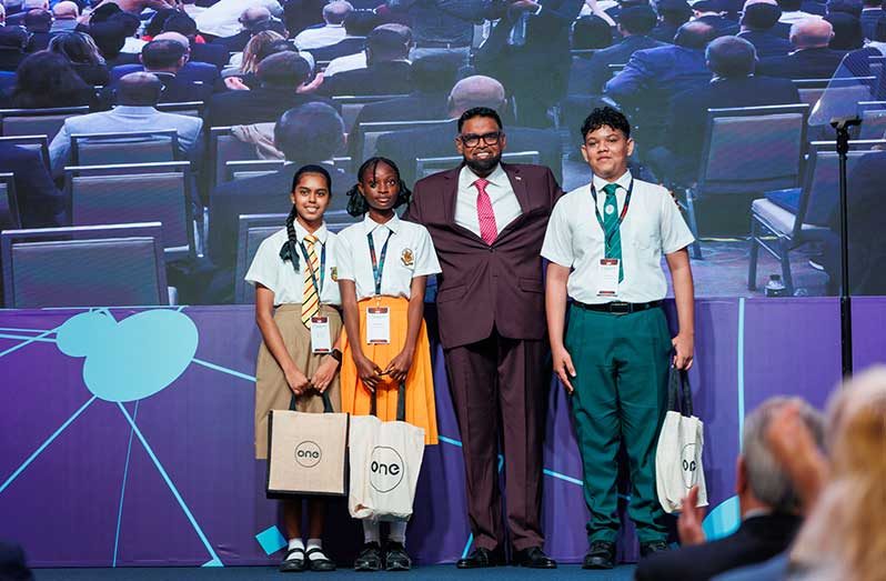 President Dr. Irfaan Ali (centre) with the winners of Category Two