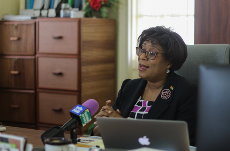Minister of Public Telecommunications, Catherine Hughes