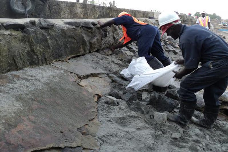 The Force Account Unit sealing the section with rocks.