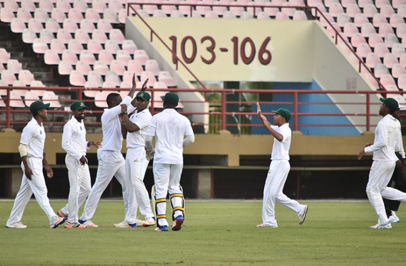 The Guyana Jaguars players celebrating the dismissal of Shai Hope.