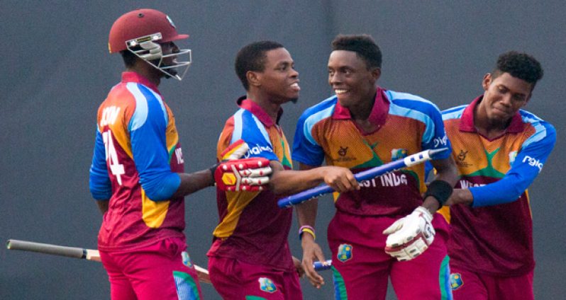 Caribbean delight! Captain Shimron Hetmyer, Shamar Springer along with Keemo Paul played crucial roles as West Indies sail through to the final of Under-19 World Cup, thrashing Bangladesh by three wickets. Also in photo is not-out batsman Ryan John. (ICC photo)