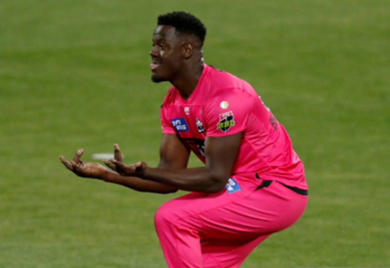 Carlos Brathwaite celebrates a wicket during the rout of the Renegades on Saturday.