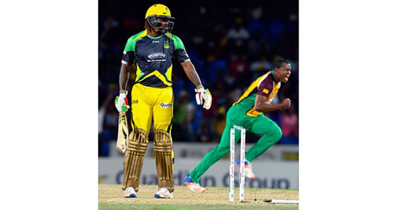 Wild celebrations erupt after Chris Gayle is bowled by Christopher Barnwell.