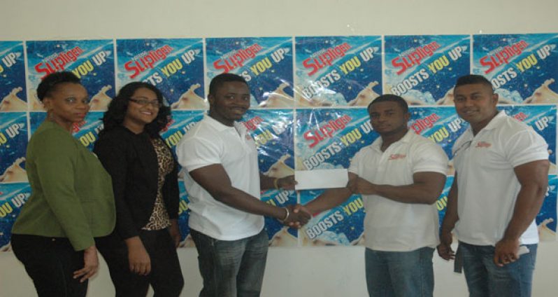 Witnessing the handing-over ceremony were GBBFF’s General Secretary Stacey McKinnon (left), Moressa Oscar – Secretary/Treasurer (2nd left), GBBFF President Keavon Bess (centre), Treion D’Anjou – Nestle Brand Manager and GBBFF Organising Secretary Videsh Sookram (right).