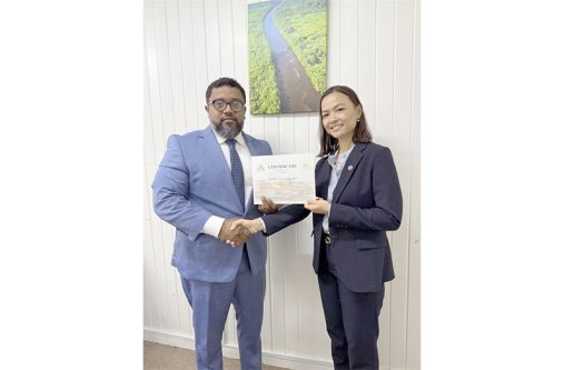 A representative of MODEC receives the company’s 2024 Local Content Certificate of Compliance from the Local Content Secretariat