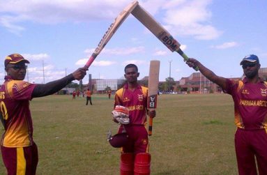 Harrinarine Chattergoon being congratulated by teammates after his epic innings.