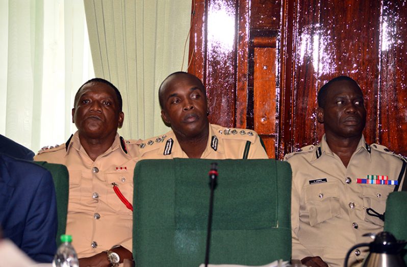 Police Commissioner Sydney James (right) sits alongside Director of Prisons, Gladwin Samuels (centre) and Fire Chief, Marlon Gentle