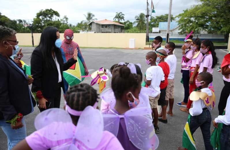 Minister of Human Services and Social Security Dr. Vindhya Persaud on Wednesday interacts with children living at the Children and Family Centre in Sophia