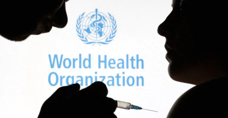 People pose with syringe with needle in front of displayed World Health Organization (WHO) logo, in this illustration taken December 11, 2021. REUTERS/Dado Ruvic/Illustration