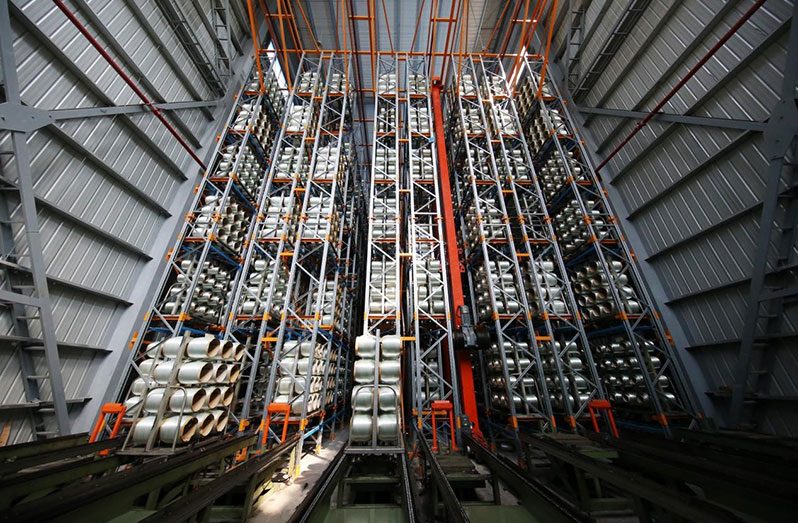 Products are automatically stored in a warehouse of a glass fiber enterprise in Qianjiang district, southwest China's Chongqing municipality, Aug. 4, 2020. (People's Daily Online/Yang Min)