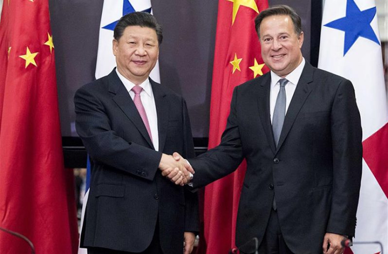 Chinese President Xi Jinping and his Panamanian
counterpart, Juan Carlos Varela