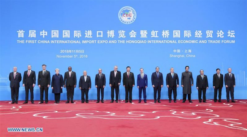 Chinese President Xi Jinping takes group photos with foreign leaders before the opening ceremony of the first China International Import Expo in Shanghai, east China