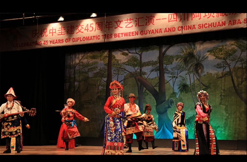 Members of the Sichuan Province Ethnic Song and Dance Ensemble performing at the event