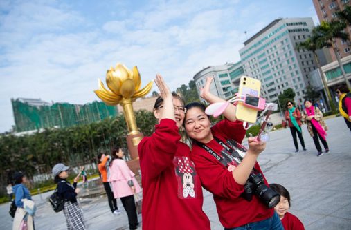 People visit the Golden Lotus Square in Macao, south China, Dec. 13, 2019. (Xinhua/Cheong Kam Ka)