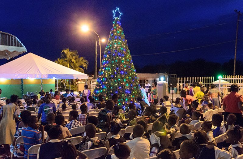 The Restoration and Life Ministries on Friday evening held its annual Christmas tree light up at the church’s compound
in Caneveiw Avenue, South Ruimveldt. The occasion was attended by children from South Ruimveldt and other neighbouring
communities who participated in the ushering-in of the jolly season. (Delano Williams photo)