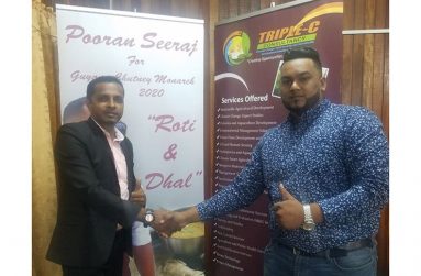 2020 Chutney Monarch competitor, Pooran Seeraj, (left), WITH Triple C Consultancy Representative, Rahul Chintamanie