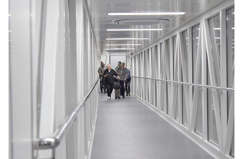 Passengers shortly after disembarking their plane at the Cheddi Jagan International Airport in March 2023 (CJIA photo)