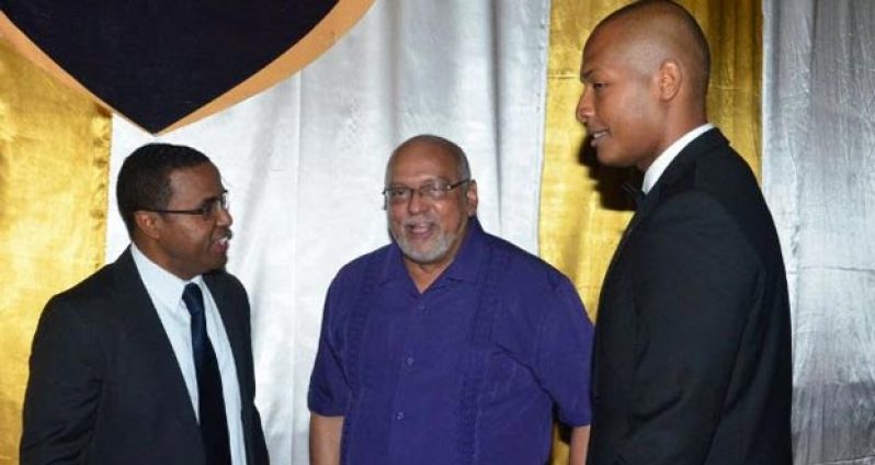 CDB Director Dr Justin Ram in discussion with President Donald Ramotar and President of the Georgetown Chamber of Commerce and Industry, Clinton Urling