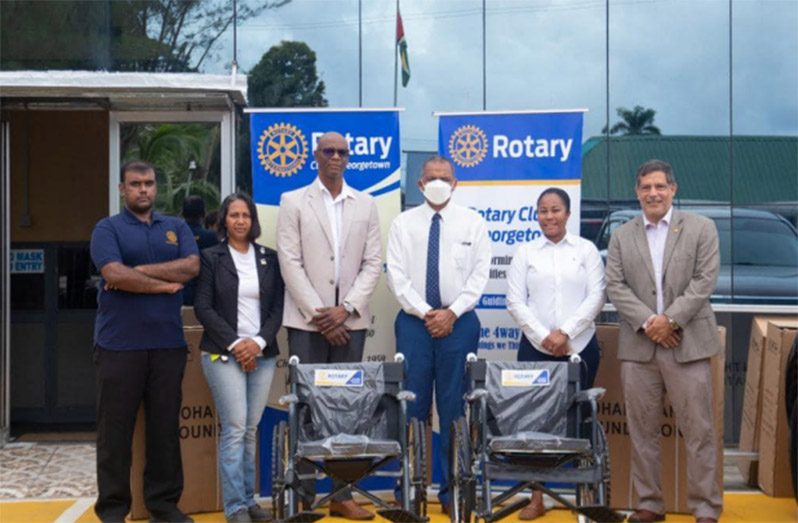 Members of the Rotary Club of Georgetown  with Minister of Health Dr Frank Anthony, and Director of the Disability and Rehabilitation Services Department at the Health Ministry, Ariane Mangar
