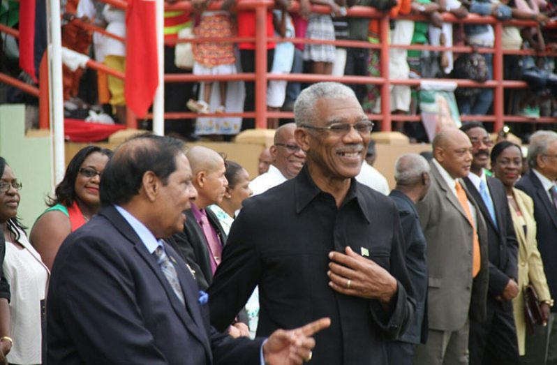 Flashback! President David Granger (right) and Prime Minister Moses Nagamootoo share a light moment during their inauguration ceremony. Also in photo are some of the ministers of government