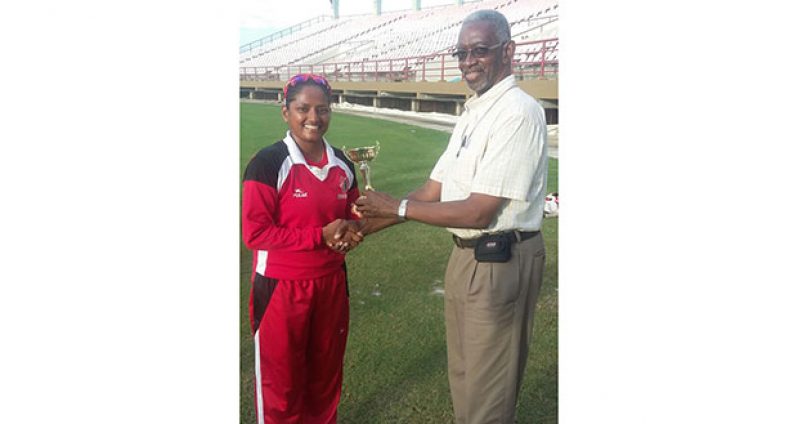 Anisa Mohammed collects her Player-of-the-Match trophy from Grantley Culbard.