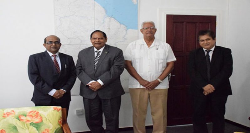 Indian High Commissioner to Guyana, Venkatachalam Mahalingam; Prime Minister Moses Nagamootoo, Minister of Agriculture Noel Holder, and an officer of the Indian High Commission to Guyana.