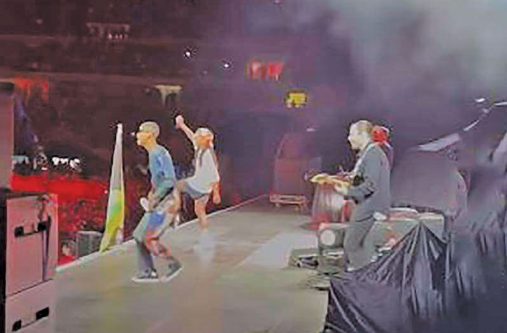 Black Panther star Letitia Wright (left) and Koffee on stage at the Jockey Club in Lima, Peru (Photo: Tik Tok)