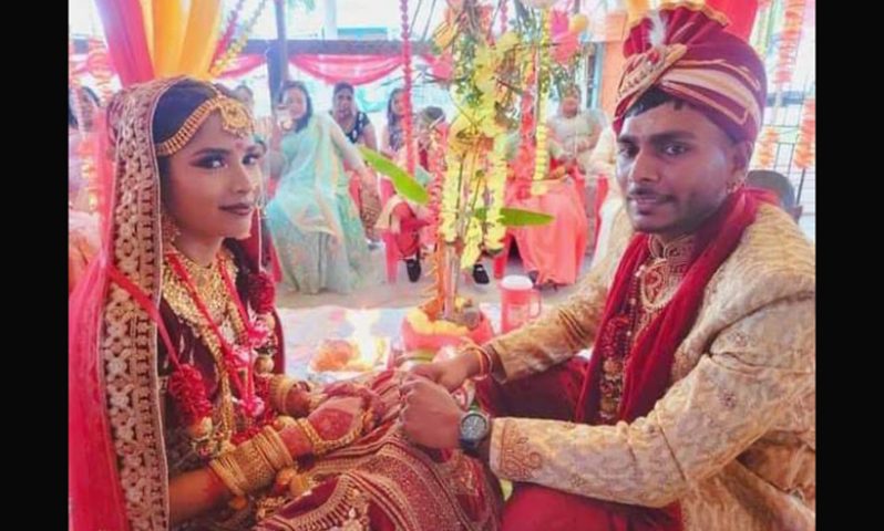 Beeshan Dhoray and his wife Viroshni Persaud during their wedding ceremony