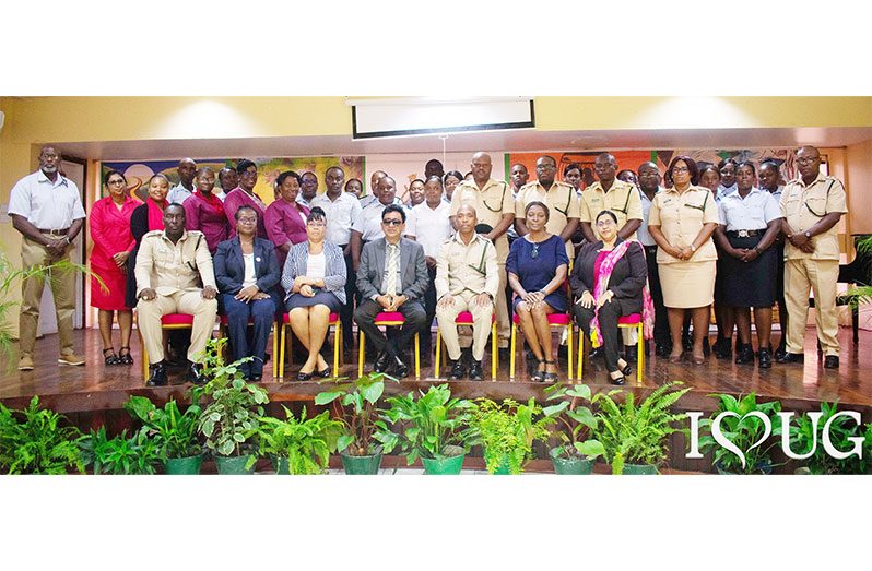 Front row from centre to right: Attorney-General and Minister of Legal Affairs, Mohabir Anil Nandlall; Director of the Guyana Prison Service, Nicklon Elliot; Deputy Vice-Chancellor for Institutional Advancement, Dr. Mellissa Ifill; Project Manager for the Support for the Criminal Justice System (SCJS), Indira Anandjit; (second from left) Director of the Institute for Human Resiliency, Strategic Security, and the Future (IHRSSF), Mrs. Debbie Hopkinson, along with other officials of the Guyana Prison Service and the University of Guyana, and the first cohort for the Responders Course on Mental, Neurological, and Substance Abuse Disorders (MNS) (UG photo)