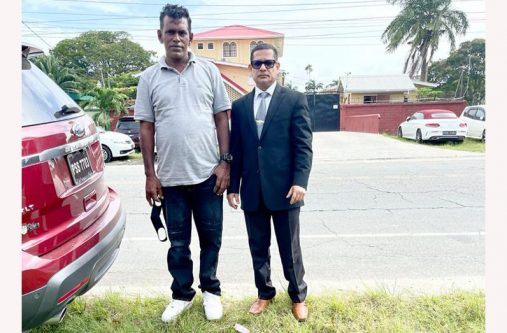 Omesh Lakeram (left) and his attorney Bernard DaSilva