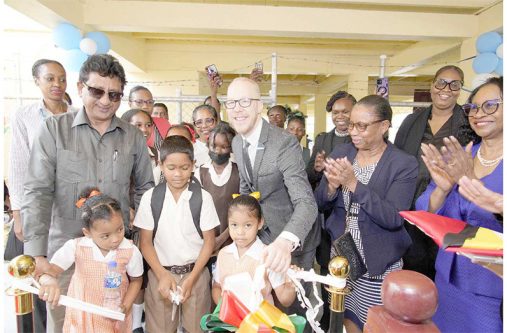 The cutting of the ribbon signals the official commissioning of Region Two’s first Children’s Court. Also pictured are Minister of Legal Affairs Mohabir Anil Nandlall, Chancellor of the Judiciary (ag) Justice Yonette Cummings-Edwards; Chief Justice (ag) Roxane George; UNICEF Area Representative (ag) for Guyana and Suriname, Mr. Gabriel Vockel and Regional 
Chairperson Vilma De Silva