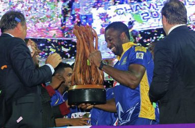 Barbados  Tridents captain Kieron Pollard with the CPL trophy after his team were declared winners on Saturday night in at Warner Park, St.Kitts.(Getty Images)