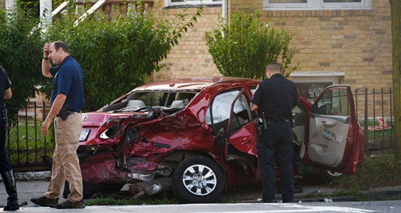 The mother and her 9-year-old daughter were ejected from the vehicle after it was struck by a BMW in Queens