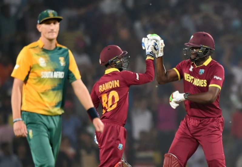 Carlos Brathwaite and Denesh Ramdin celebrate West Indies' win, South Africa v West Indies, World T20 2016