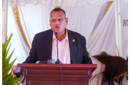 Minister of Housing Collin Croal delivering remarks