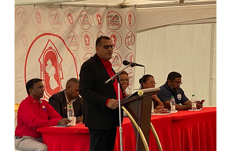 Minister of Housing, Collin Croal, addresses residents during an outreach at Anna Regina on Friday