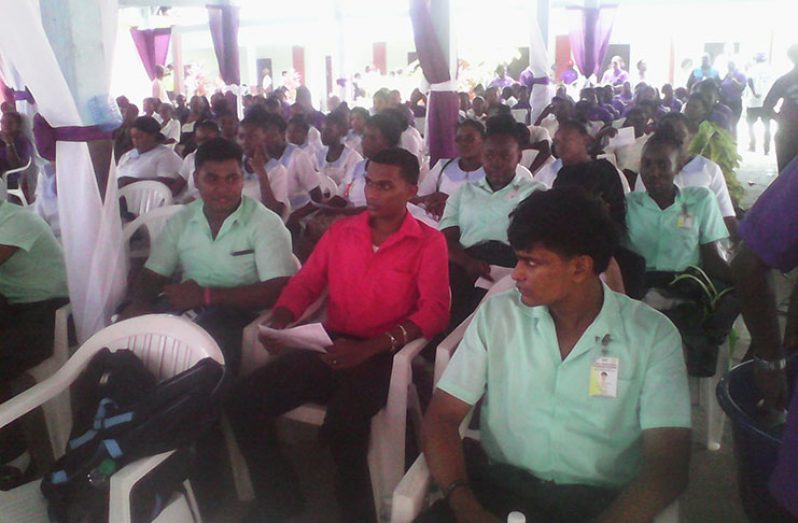 Students along with nurses listening to speakers during the mental health rally