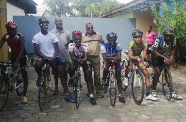 Team Guyana after training yesterday, at the Star Dust Hotel in Suriname, with national cycling coach within the National Sports Commission, Hassan Mohamed (at centre). (Rawle Toney photo)