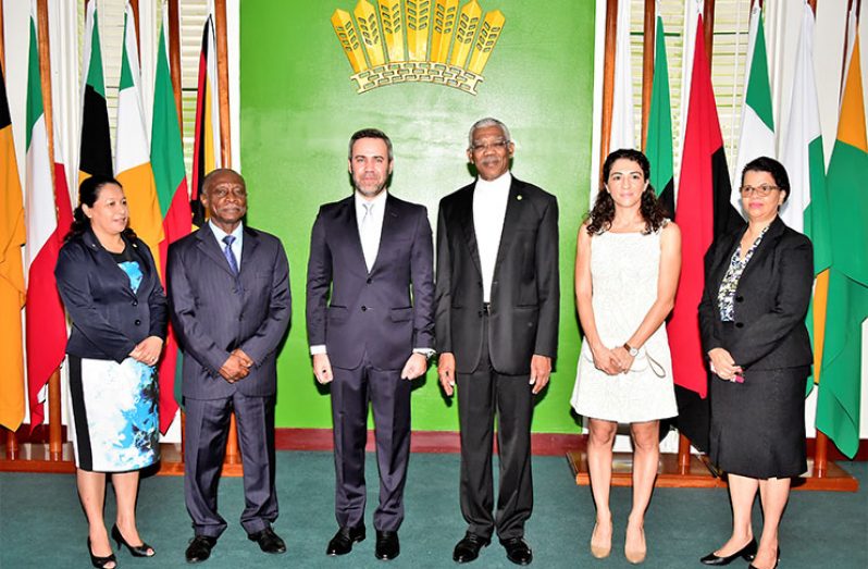 After the formalities: From left are: Minister of Public Affairs, Ms. Dawn Hastings-Williams; Minister of Foreign Affairs, Mr. Carl Greenidge; High Commissioner Haralambos Kafkarides; President David Granger; Mrs. Kafkarides; and Director-General of the Ministry of Foreign Affairs, Ms. Audrey Waddell