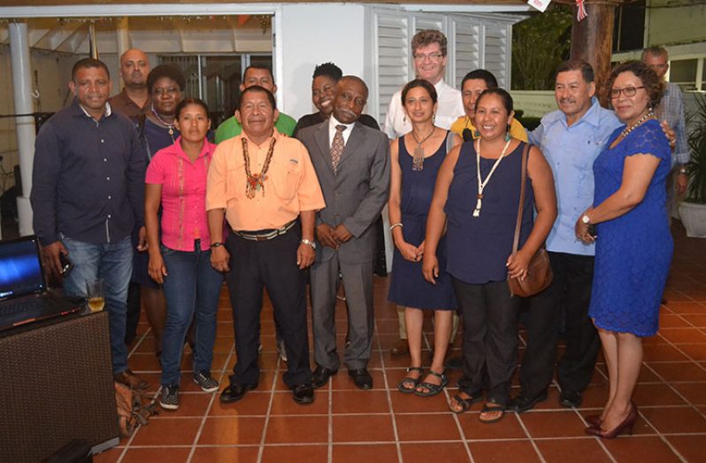 Minister of Foreign Affairs, Carl Greenidge (centre), Minister of Indigenous Peoples’ Affairs, Sydney Allicock (second right), Minister within the Ministry of Indigenous Peoples’ Affairs, Valerie Garrido- Lowe (right) and British High Commissioner to Guyana, His Excellency, Greg Quinn is  flanked by representatives of other partners of the Darwin Initiative; Integrating Traditional Knowledge into National Policy and Practice Project