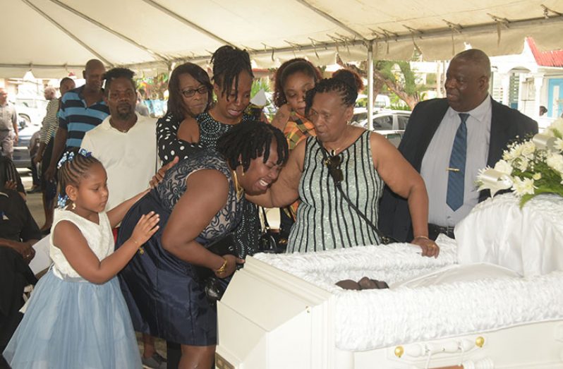 Relatives of the late city councillor pay their respects