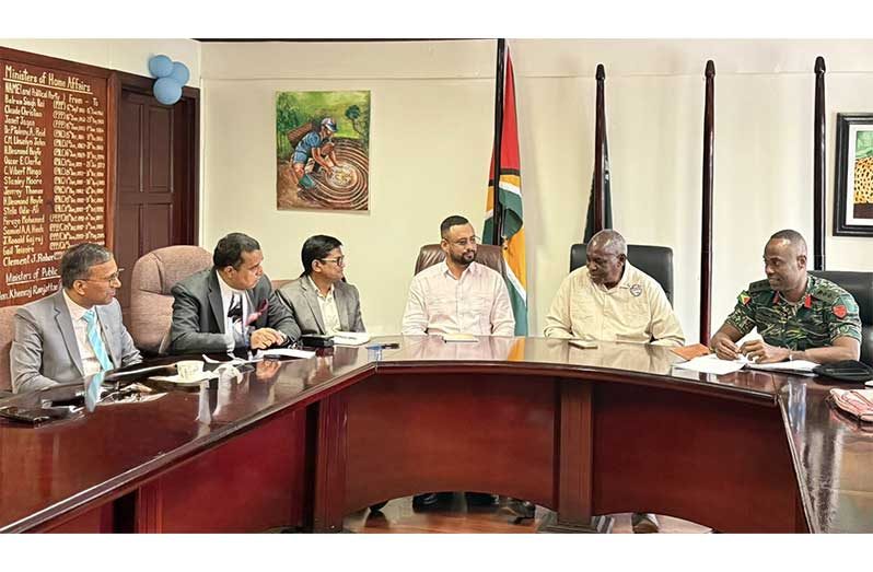 Minister of Home Affairs, Robeson Benn; Permanent Secretary, Mr. Andre Ally; Acting Chief of Defence Staff and Director of the National Intelligence and Security Agency (NISA), Colonel Sheldon Howell; Charis Griffith, Acting Director of the Guyana Forensic Science Laboratory (GFSL), in discussion with India’s National Forensic Sciences University (NFSU) officials, at the Ministry of Home Affairs