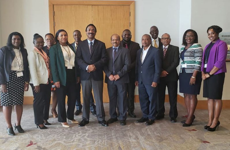 Attorney-General and Minister of Legal Affairs, Basil Williams, SC, and members of the delegation at the conference